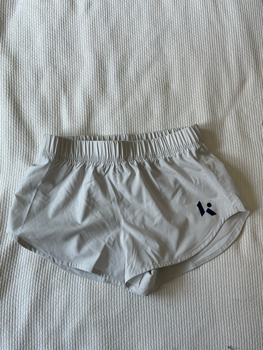 New Balance Light Gray Athletic Shorts with Navy Logo